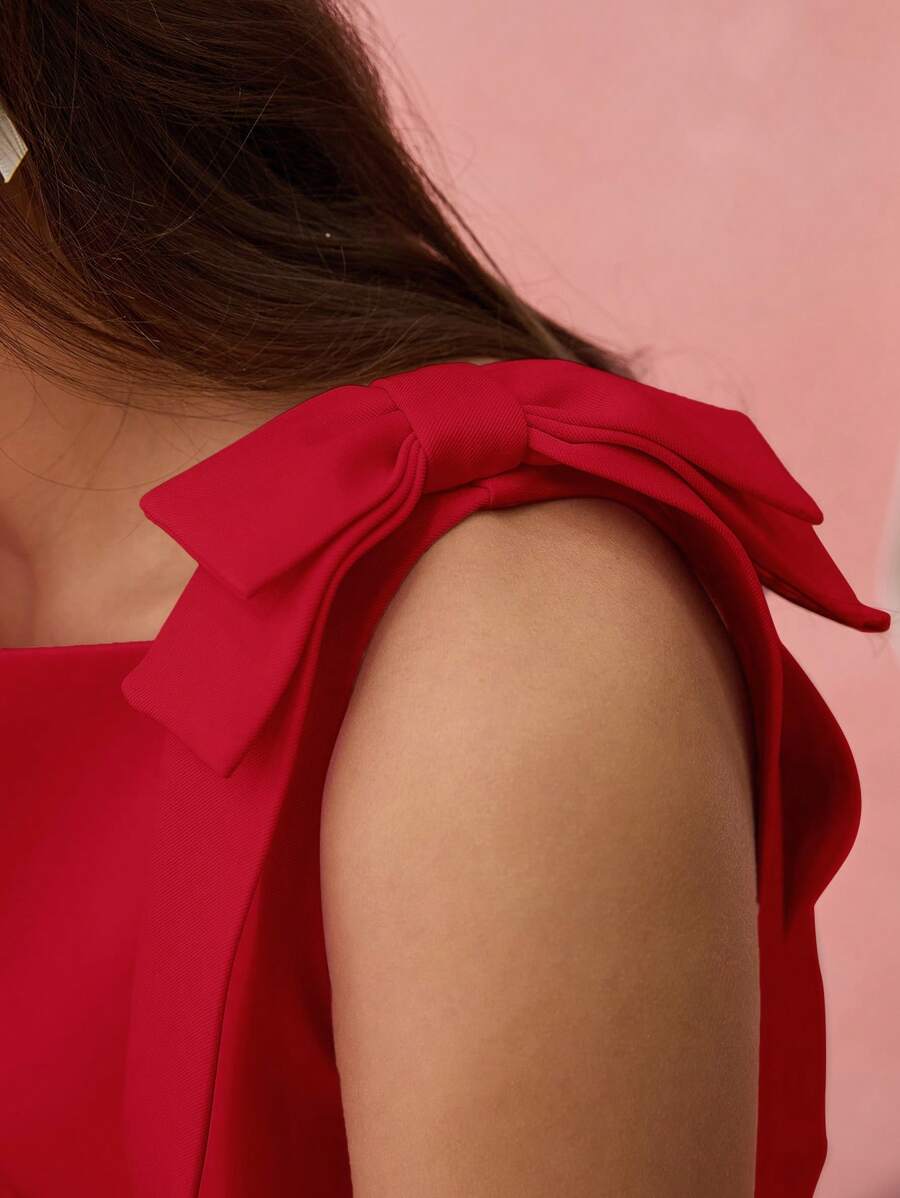 Vestido mini com laço sem mangas