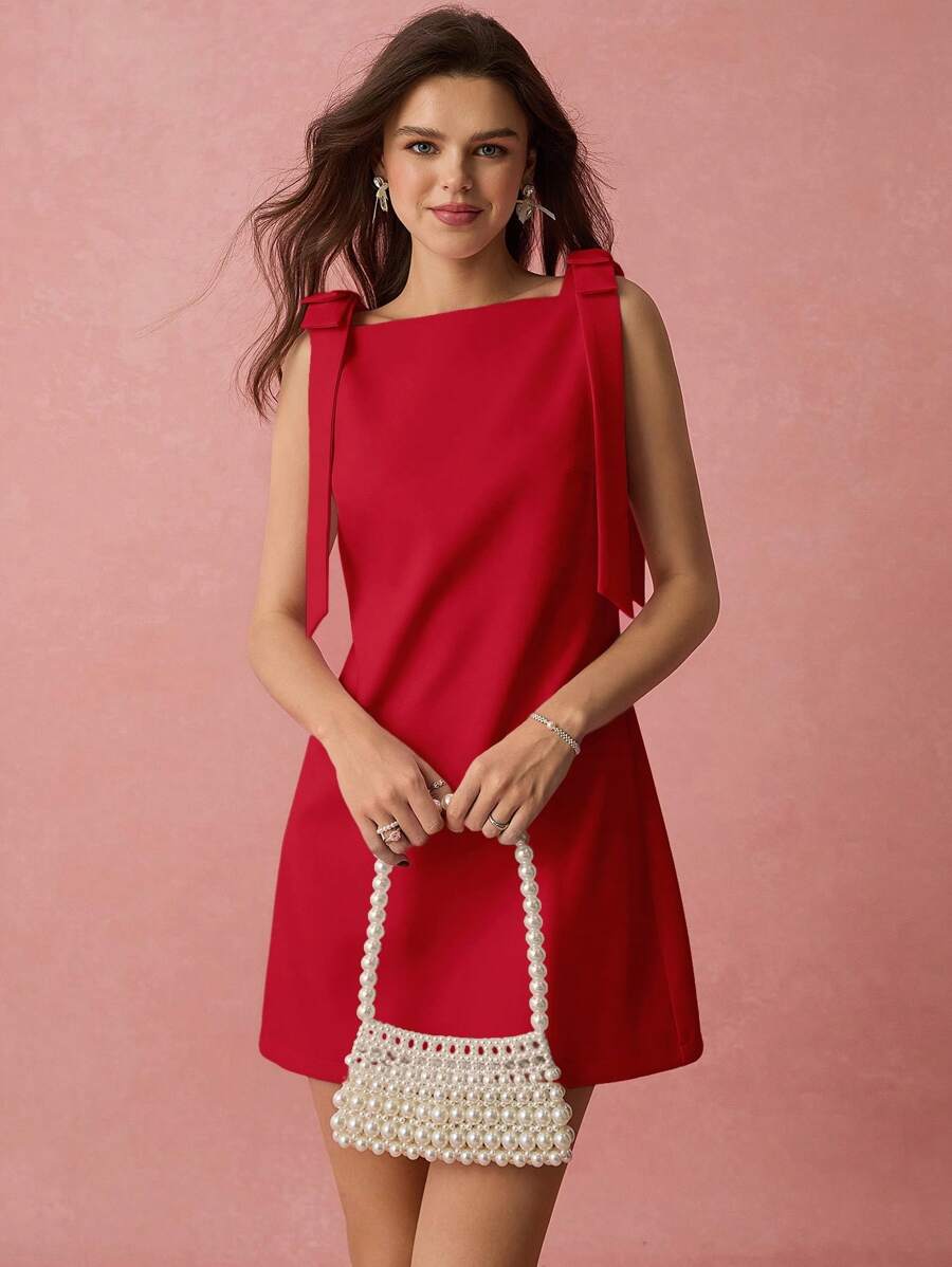 Vestido mini com laço sem mangas