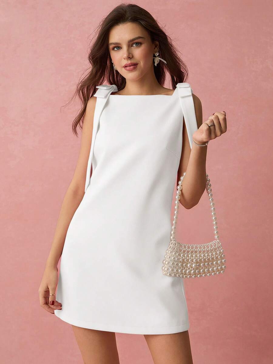 Vestido mini com laço sem mangas