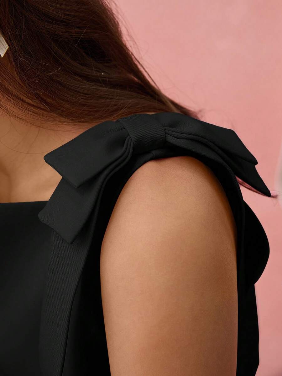 Vestido mini com laço sem mangas