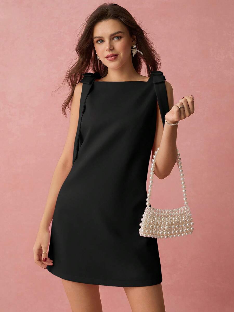 Vestido mini com laço sem mangas