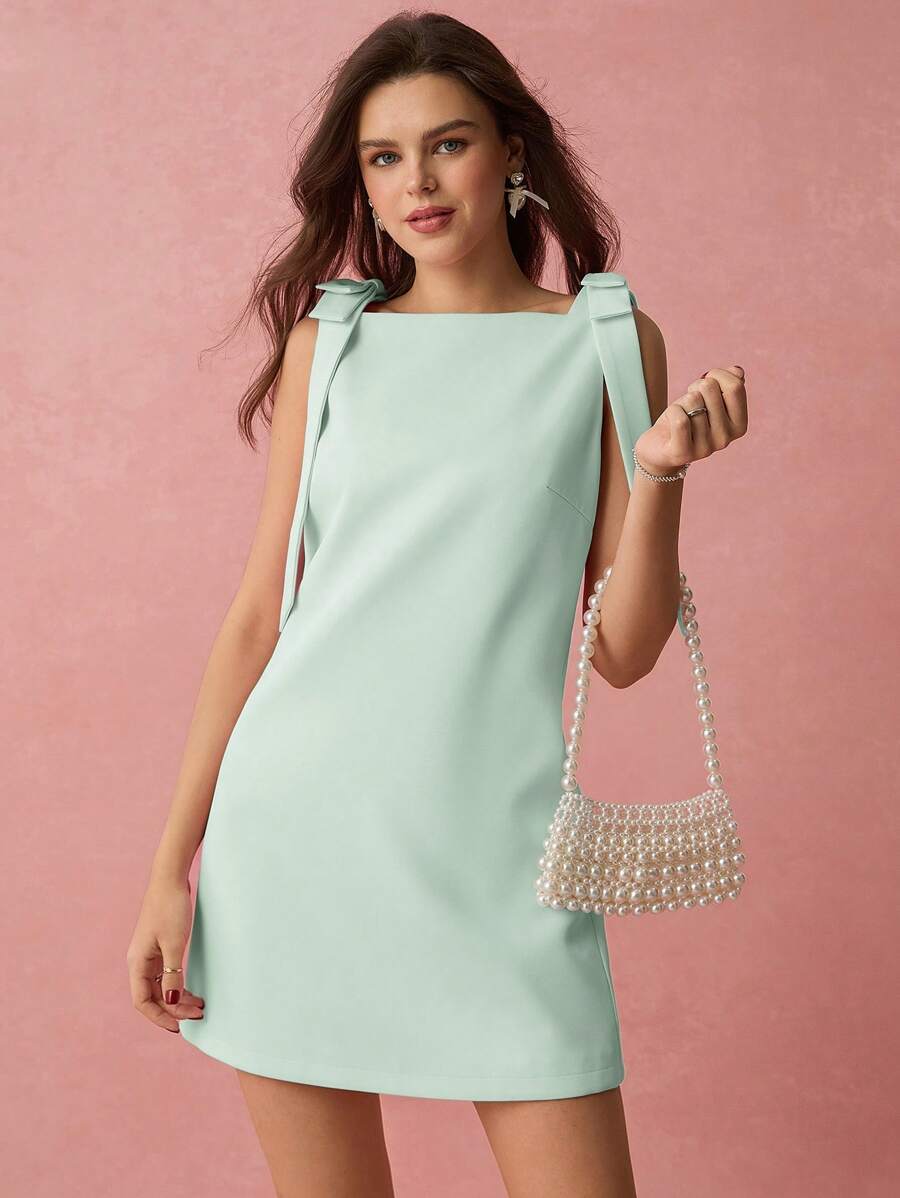 Vestido mini com laço sem mangas